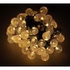 Lampki-ogrodowe-solarne-kulki-7m-50LED-cieply-bialy-8