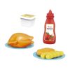 Smakowite plastelinowe produkty układają się na stole, w tym przyprawa ketchup, mięso z kurczaka, pieczywo i frytki, idealne do kreatywnej zabawy w kuchni dla dzieci.
